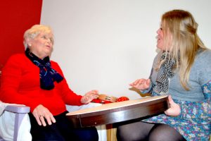 Music-therapist-elderly-drum-health-community